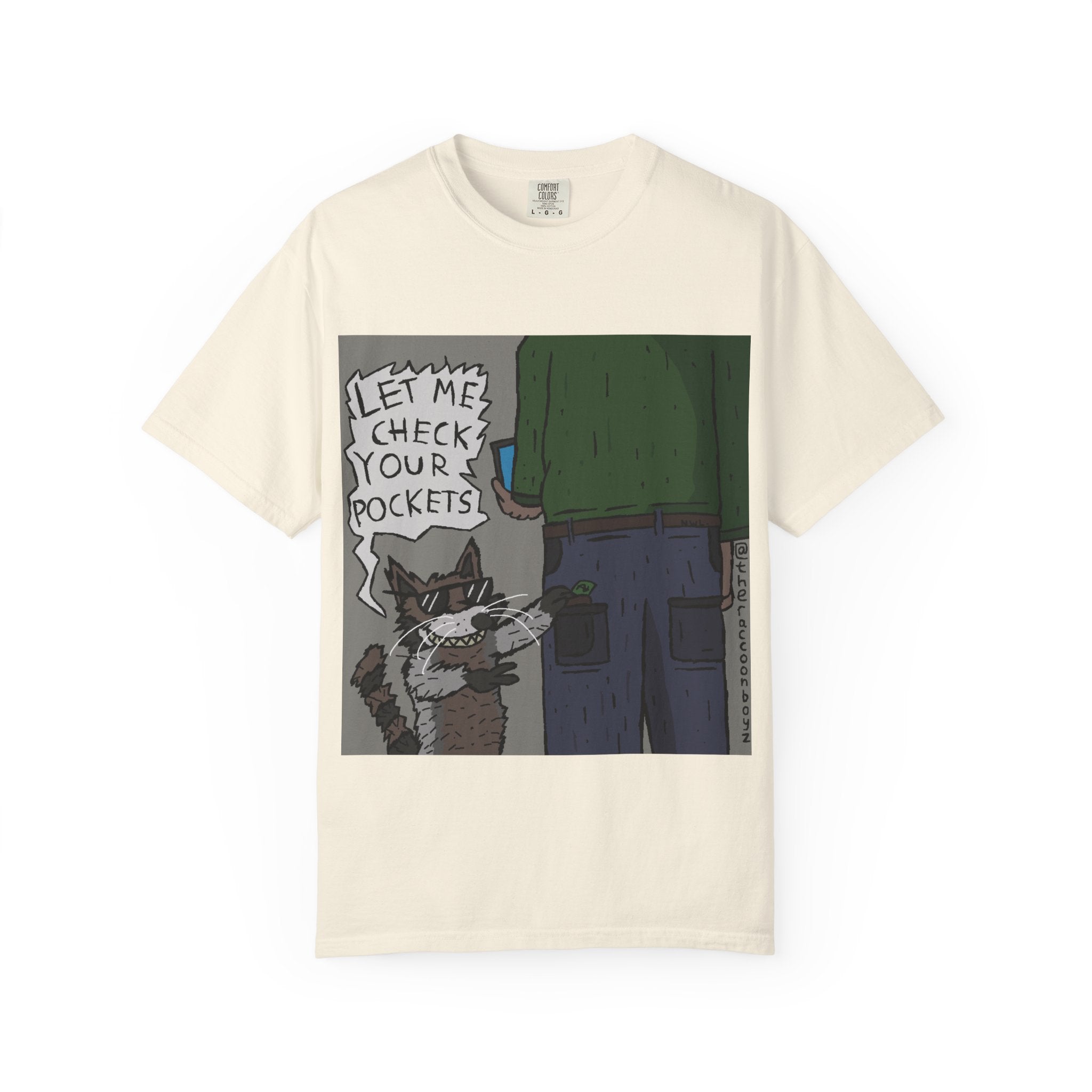 T-Shirt — Funny Racoon Cartoon Saying “Let Me Check Your Pockets” — Humorous Animal Graphic Tee